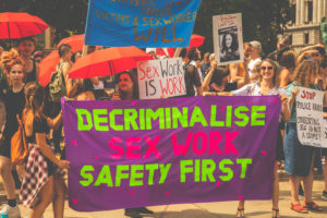 Sex workers demonstrate outside a parlimentary debate in London on the 4th July 2018, to protest discussion of a UK version of FOSTA (A US law that criminalises the advertising of sex work on the internet) and to draw attention to their campaign to fully decriminalise sex work.