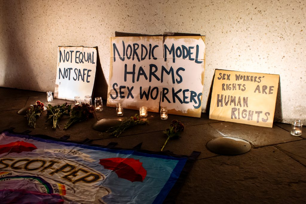 Signs and banner outside Scottish Parliament